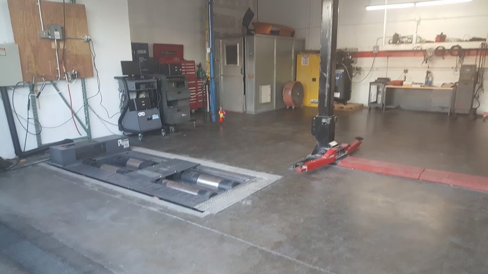 Service bay with alignment rack